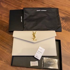 UPTOWN POUCH IN GRAIN DE POUDRE EMBOSSED LEATHER